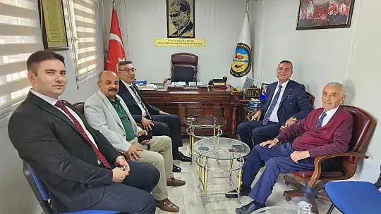 Halkbank Bölge Müdürü Türközü'nden ESKKK Başkanı Evren'e Ziyaret